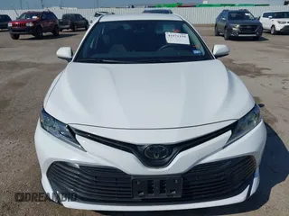 2019 Toyota Camry LE with VIN 4T1B11HK9KU825107, listed as a IAAI auction lot 41971159 with 15,802 mi miles and . Bid and sale history available at DreamBid. Image 6.