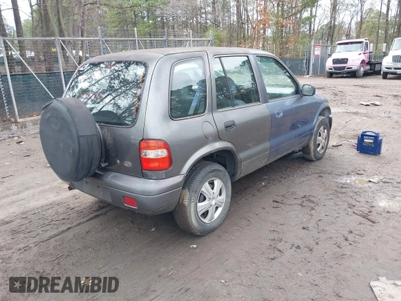 2001 Kia Sportage with VIN KNDJB723515095478, listed as a IAAI auction lot 41823976 with 185,652 mi miles. Bid and sale history available at carsss.com. Image 4.