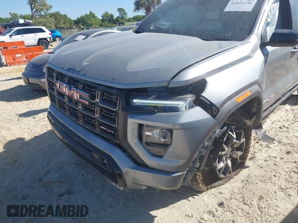 2024 GMC Canyon 4WD AT4X with VIN 1GTP6EEK6R1250127, listed as a IAAI auction lot 41823196 with 1,574 mi miles and . Bid and sale history available at carsss.com. Image 6.