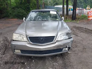 2002 Acura RL with VIN JH4KA96682C009762, listed as a IAAI auction lot 42450219 with 207,765 mi miles and . Bid and sale history available at DreamBid. Image 12.