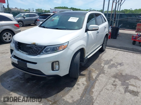 2014 Kia Sorento SX z VIN 5XYKWDA70EG541044, wystawiony jako IAAI lot #42301841 z przebiegiem 196 550 mil mil oraz . Historia ofert i sprzedaży dostępna na DreamBid. Obrazek 17.
