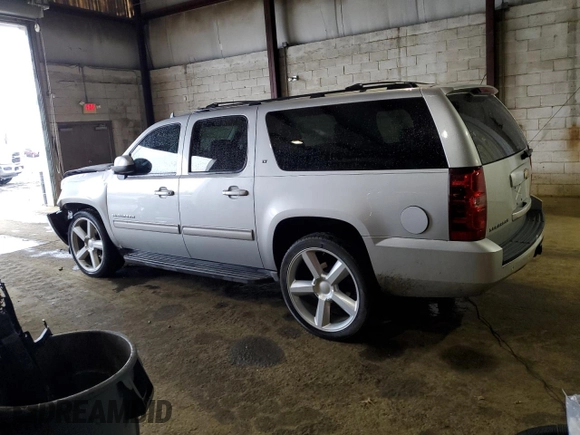 2013 Chevrolet Suburban LT with VIN 1GNSCJE00DR260275, listed as a Copart auction lot 50394425 with 140,464 mi miles and Salvage title. Bid and sale history available at DreamBid. Image 2.