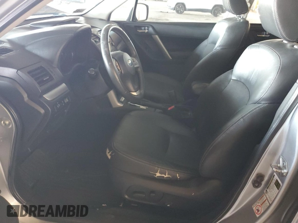 2015 Subaru Forester Touring with VIN JF2SJAUC7FH437389, listed as a Copart auction lot 62701025 with Not provided miles and Salvage title. Bid and sale history available at DreamBid. Image 7.