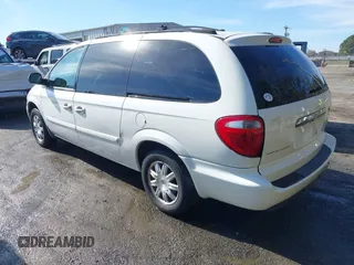 2006 Chrysler Town & Country LWB Touring with VIN 2A8GP54L56R671585, listed as a IAAI auction lot 41475419 with 166,861 mi miles. Bid and sale history available at carsss.com. Image 3.