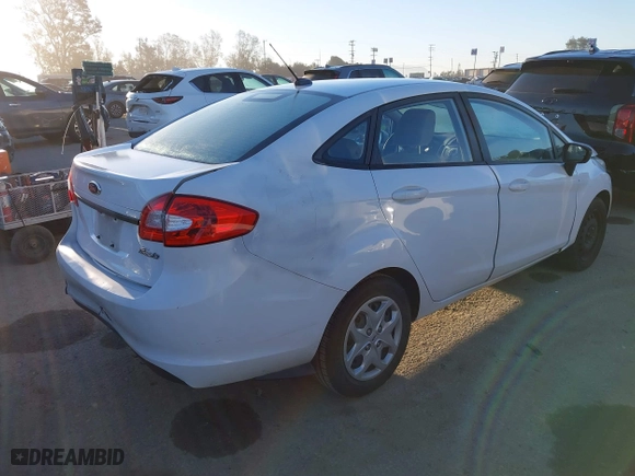 2013 Ford Fiesta S with VIN 3FADP4AJXDM156194, listed as a IAAI auction lot 41870811 with 89,446 mi miles. Bid and sale history available at carsss.com. Image 4.