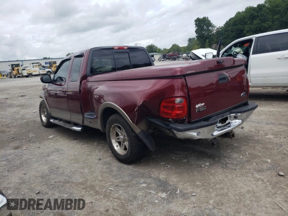 2003 Ford F-150 XL with VIN 1FTRX07L73KC07352, listed as a Copart auction lot 64639214 with 108,003 mi miles and Salvage title. Bid and sale history available at DreamBid. Image 2.