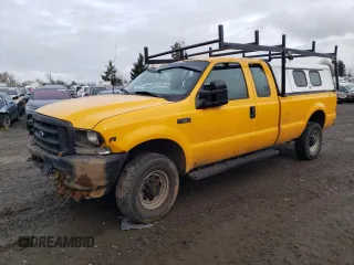 2002 Ford F-350 XL with VIN 1FTSX31L12EC83772, listed as a Copart auction lot 85712634 with 177,059 mi miles and Salvage title. Bid and sale history available at DreamBid. Image 1.