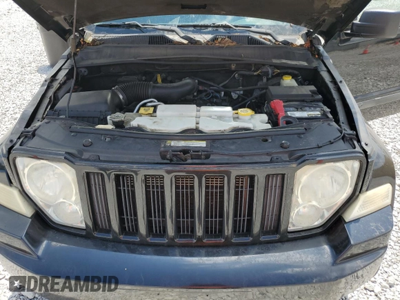 2011 Jeep Liberty Sport with VIN 1J4PN2GK5BW522989, listed as a Copart auction lot 62014165 with 149,506 mi miles and Salvage title. Bid and sale history available at DreamBid. Image 12.