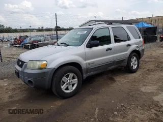 2005 Ford Escape Hybrid with VIN 1FMCU96H55KC74059, listed as a Copart auction lot 57065685 with 154,807 mi miles and Salvage title. Bid and sale history available at DreamBid. Image 1.
