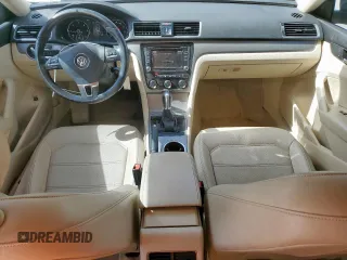 2014 Volkswagen Passat SE z VIN 1VWBN7A35EC066557, wystawiony jako Copart lot #57065545 z przebiegiem 112 154 mil mil oraz Szkoda całkowita • Salvage title. Historia ofert i sprzedaży dostępna na DreamBid. Obrazek 8.