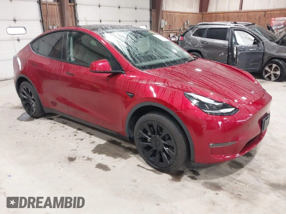 2024 Tesla Model Y Long Range with VIN 7SAYGAEE2RF986206, listed as a IAAI auction lot 42177852 with 14,399 mi miles and . Bid and sale history available at DreamBid. Image 1.