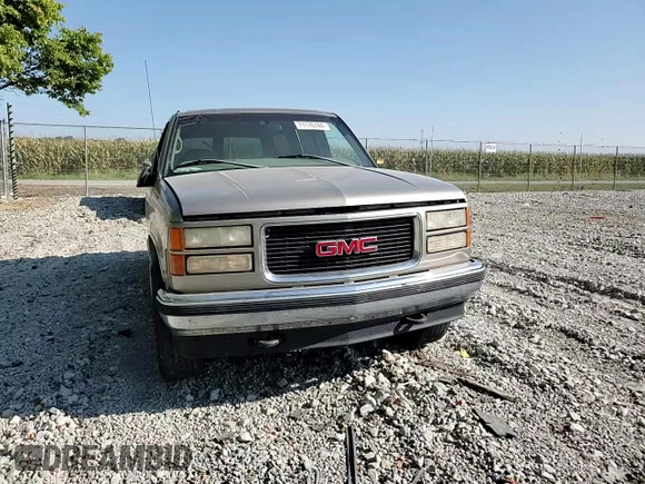 1999 GMC Yukon with VIN 1GKEK13R5XJ725991, listed as a Copart auction lot 71176784 with 245,481 mi miles and Clean Title. Bid and sale history available at carsss.com. Image 11.