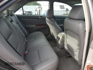 2006 Toyota Camry LE z VIN 4T1BF30K46U628070, wystawiony jako Copart lot #54582755 z przebiegiem 278 805 mil mil oraz Szkoda całkowita • Salvage title. Historia ofert i sprzedaży dostępna na DreamBid. Obrazek 10.