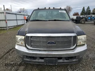 2003 Ford Super Duty F-250 XL with VIN 1FTNX21L13EB63351, listed as a Copart auction lot 85092674 with 265,515 mi miles and Salvage Title. Bid and sale history available at carsss.com. Image 5.