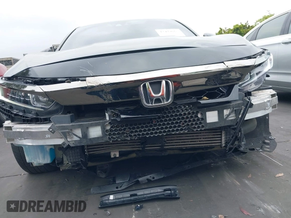 2019 Honda Accord Sport with VIN 1HGCV2F38KA030812, listed as a IAAI auction lot 42429667 with 98,648 mi miles and . Bid and sale history available at DreamBid. Image 20.