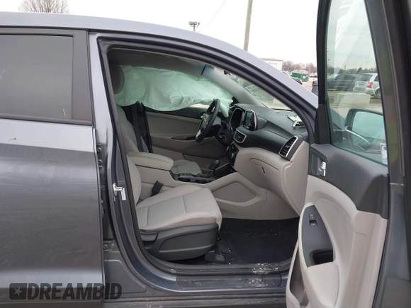 2021 Hyundai Tucson SE with VIN KM8J23A40MU299596, listed as a IAAI auction lot 41513198 with 54,284 mi miles and . Bid and sale history available at DreamBid. Image 5.