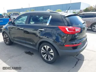2011 Kia Sportage SX with VIN KNDPC3A69B7149771, listed as a IAAI auction lot 42012102 with 125,157 mi miles. Bid and sale history available at carsss.com. Image 3.
