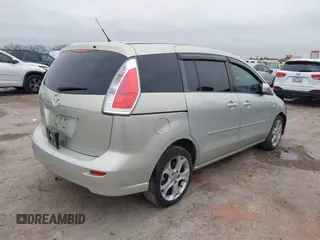 2008 Mazda 5 Sport with VIN JM1CR293080303089, listed as a IAAI auction lot 41434166 with 127,573 mi miles and . Bid and sale history available at carsss.com. Image 4.