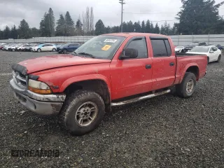 2000 Dodge Dakota Sport with VIN 1B7GG2AN8YS666541, listed as a Copart auction lot 86845794 with 232,639 mi miles and Salvage Title. Bid and sale history available at carsss.com. Image 1.
