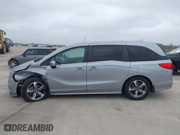 2019 Honda Odyssey Touring with VIN 5FNRL6H89KB045003, listed as a IAAI auction lot 41965310 with 69,043 mi miles. Bid and sale history available at carsss.com. Image 14.