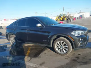 2019 BMW X6 sDrive35i with VIN 5UXKU0C57K0S97581, listed as a IAAI auction lot 41322568 with 76,635 mi miles. Bid and sale history available at carsss.com. Image 13.