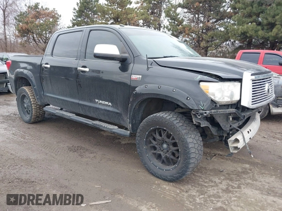 2012 Toyota Tundra 4WD Truck LTD with VIN 5TFHW5F19CX218772, listed as a IAAI auction lot 41472955 with 134,928 mi miles. Bid and sale history available at carsss.com. Image 1.