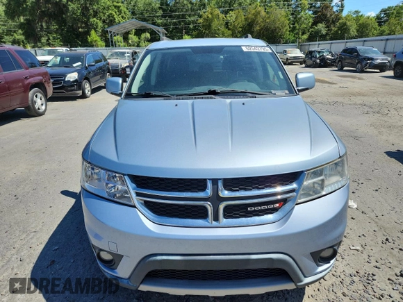 2013 Dodge Journey Crew with VIN 3C4PDCDG5DT599840, listed as a Copart auction lot 62542795 with 102,235 mi miles and Salvage title. Bid and sale history available at DreamBid. Image 5.