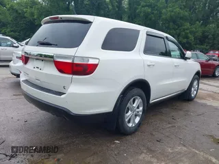 2012 Dodge Durango SXT with VIN 1C4RDJAG8CC336267, listed as a IAAI auction lot 42377138 with 179,555 mi miles and . Bid and sale history available at DreamBid. Image 4.