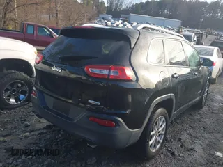 2014 Jeep Cherokee Latitude z VIN 1C4PJLCS5EW105809, wystawiony jako IAAI lot #41331585 z przebiegiem 207 609 mil mil oraz . Historia ofert i sprzedaży dostępna na DreamBid. Obrazek 4.
