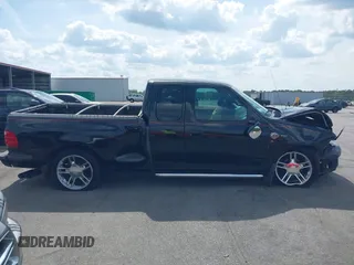 2000 Ford F-150 XL z VIN 2FTRX07L9YCA98355, wystawiony jako IAAI lot #42123587 z przebiegiem 191 000 mil mil oraz . Historia ofert i sprzedaży dostępna na DreamBid. Obrazek 13.
