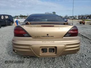 1999 Pontiac Grand Am SE2 with VIN 1G2NE52EXXM716313, listed as a Copart auction lot 86522744 with 102,438 mi miles and Salvage Title. Bid and sale history available at carsss.com. Image 6.