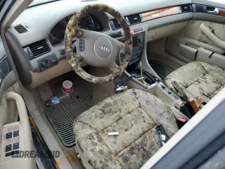 2004 Audi A6 z VIN WAUML54B04N013211, wystawiony jako Copart lot #74279954 z przebiegiem Nie podano mil oraz Szkoda całkowita • Salvage title. Historia ofert i sprzedaży dostępna na DreamBid. Obrazek 8.
