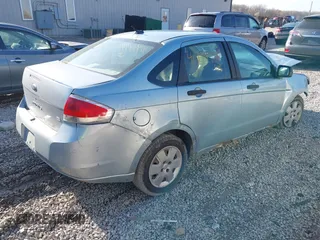 2008 Ford Focus S with VIN 1FAHP34N48W251897, listed as a IAAI auction lot 41994941 with 213,468 mi miles. Bid and sale history available at carsss.com. Image 4.