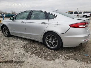 2019 Ford Fusion Hybrid Titanium with VIN 3FA6P0RU1KR222518, listed as a Copart auction lot 66924692 with 64,249 mi miles. Bid and sale history available at carsss.com. Image 2.