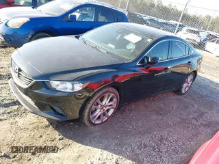 2017 Mazda Mazda6 Touring with VIN JM1GL1V59H1128257, listed as a IAAI auction lot 41503300 with 123,640 mi miles. Bid and sale history available at carsss.com. Image 2.