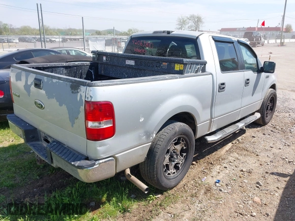 2005 Ford F-150 XLT with VIN 1FTPW12505KD72168, listed as a IAAI auction lot 42063810 with 232,964 mi miles. Bid and sale history available at carsss.com. Image 4.