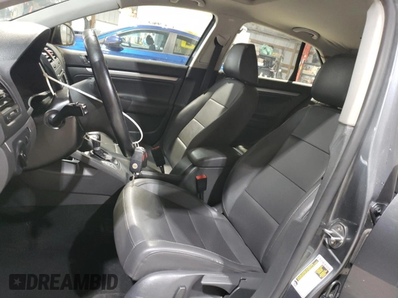 2009 Volkswagen Jetta SE with VIN 3VWRZ71K79M016032, listed as a Copart auction lot 59369445 with 177,075 mi miles and Salvage title. Bid and sale history available at DreamBid. Image 7.