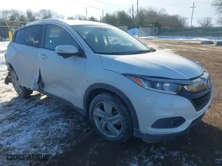 2020 Honda HR-V EX with VIN 3CZRU6H55LM731842, listed as a IAAI auction lot 41408491 with 74,088 mi miles. Bid and sale history available at carsss.com. Image 1.
