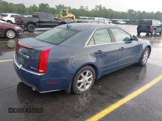2009 Cadillac CTS AWD w/1SB with VIN 1G6DT57V190120218, listed as a IAAI auction lot 42105030 with 214,031 mi miles. Bid and sale history available at carsss.com. Image 4.