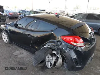 2013 Hyundai Veloster w/Black Int with VIN KMHTC6AD6DU088815, listed as a IAAI auction lot 42184776 with 204,930 mi miles and . Bid and sale history available at DreamBid. Image 3.