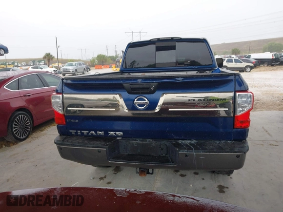 2016 Nissan Titan Platinum Reserve z VIN 1N6BA1F20GN509360, wystawiony jako IAAI lot #41921670 z przebiegiem 164 784 mil mil oraz . Historia ofert i sprzedaży dostępna na DreamBid. Obrazek 17.