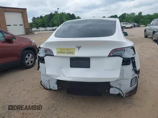 2021 Tesla Model Y Long Range with VIN 5YJYGDEE7MF198867, listed as a IAAI auction lot 42117463 with 79,759 mi miles and . Bid and sale history available at DreamBid. Image 16.