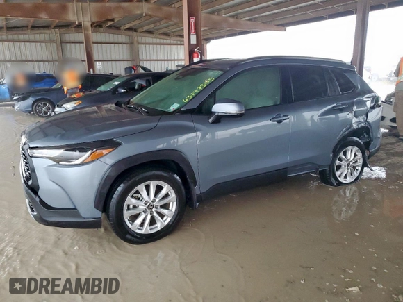 2023 Toyota Corolla Cross LE with VIN 7MUBAAAG4PV042580, listed as a Copart auction lot 63797305 with 59,576 mi miles and Salvage title. Bid and sale history available at DreamBid. Image 1.