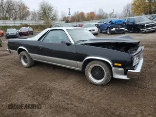 1986 GMC Caballero z VIN 3GTCW80Z1GS801760, wystawiony jako Copart lot #77592504 z przebiegiem 64 797 mil mil oraz Tytuł czysty. Historia ofert i sprzedaży dostępna na DreamBid. Obrazek 4.