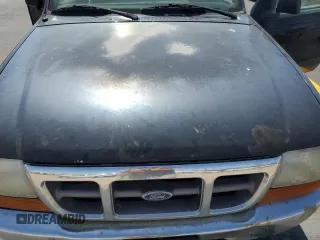 1999 Ford Ranger XLT z VIN 1FTZR15X9XPA87648, wystawiony jako Copart lot #57686645 z przebiegiem 254 120 mil mil oraz Czysty tytuł • Clean title. Historia ofert i sprzedaży dostępna na DreamBid. Obrazek 11.