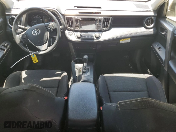 2018 Toyota RAV4 XLE with VIN JTMWFREV1JD122524, listed as a Copart auction lot 63707745 with 51,003 mi miles and Salvage title. Bid and sale history available at DreamBid. Image 8.
