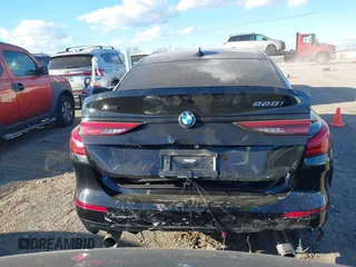 2021 BMW 2 Series 228i xDrive with VIN WBA73AK03M7H66827, listed as a IAAI auction lot 41682959 with 57,875 mi miles and . Bid and sale history available at DreamBid. Image 16.