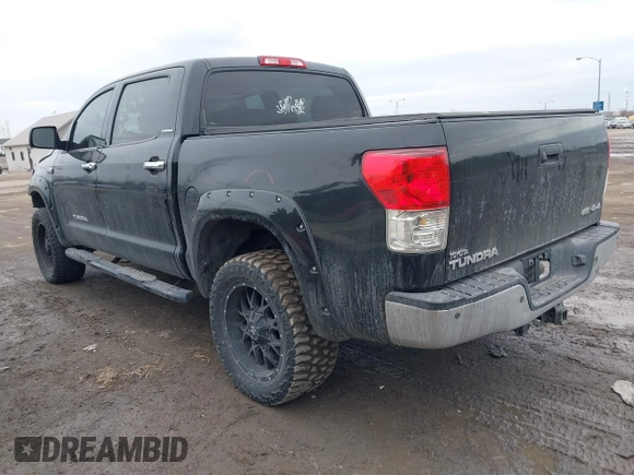 2012 Toyota Tundra 4WD Truck LTD with VIN 5TFHW5F19CX218772, listed as a IAAI auction lot 41472955 with 134,928 mi miles. Bid and sale history available at carsss.com. Image 3.