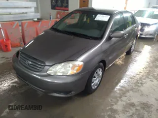 2004 Toyota Corolla CE with VIN 1NXBR32E14Z204650, listed as a IAAI auction lot 41710452 with 168,099 mi miles. Bid and sale history available at carsss.com. Image 2.