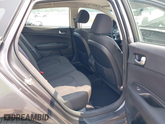2016 Kia Optima LX with VIN KNAGT4L33G5111199, listed as a IAAI auction lot 42380970 with 97,072 mi miles and . Bid and sale history available at DreamBid. Image 8.
